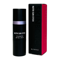 Load image into Gallery viewer, A sun stick with SPF 50+/PA+++ protection, the product is in a black tube with a pink label, next to its pink box.