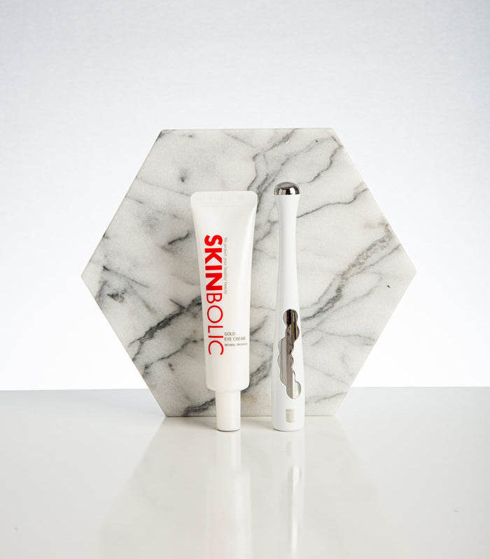 SKINBOLIC skincare product on a marble stand with a white background
